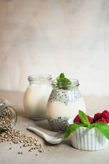 Healthy vanilla hemp pudding in a glass with fresh berries