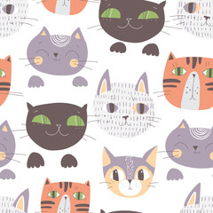 Cute cats muzzles seamless pattern. Artistic nursery background.
