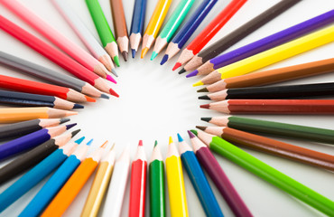 colored pencils lying around the heart