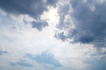 Dramatic sky background with fiery clouds, yellow, orange and pink colour, nature background. Beautiful skies