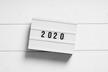 year 2020 on light box sign - minimalist preview or review concept