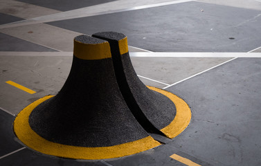 Concrete blocks with caution pattern road fence details