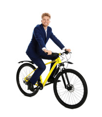 Obraz na płótnie Canvas Young businessman riding bicycle on white background