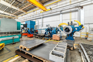 CNC Roller forming machine. The interior of the plant producing a metal profile.