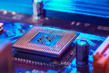 chip is highlighted with blue light. Technology background