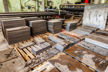 Small metal processing workshop. Sheet metal cutting plant.