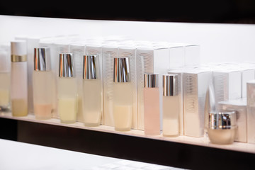 Bottle for luxury cosmetic products such as cream or body milk on beauty store shelves