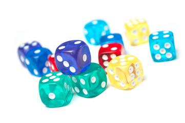Closeup of colorful dices on white background