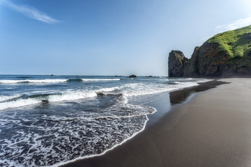 The coast of the Pacific Ocean on the Kamchatka Peninsula, Russia.