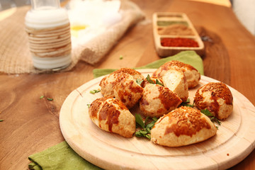 Patty with ingredients on the wooden table