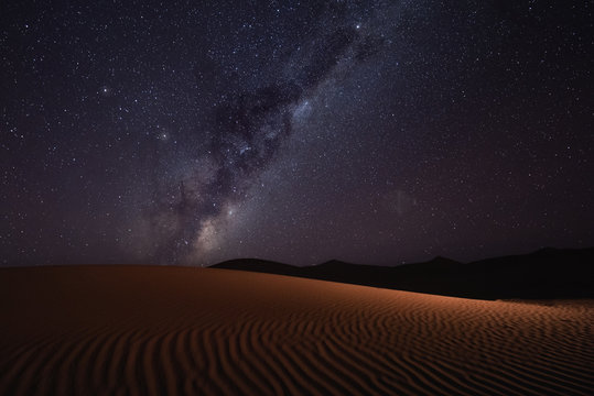 Milky Way rising over the sand dunes of Sossusvlei, Namibia