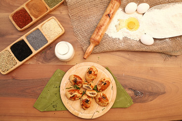 Patty with ingredients on the wooden table