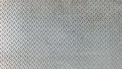 silver steel diamond plate pattern background texture.