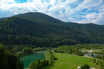 Naklejka na ściany i meble View from Sylvenstein Dam towards river Isar in summer