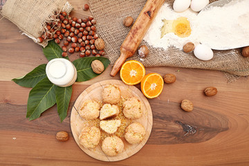 Cookies with ingredients on the wooden table