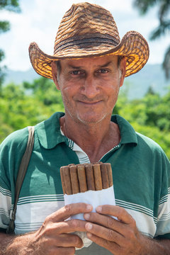 Local man selling Cuban cigars in Vinales, Cuba