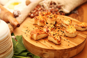 Salty cookie with ingredients on the wooden table
