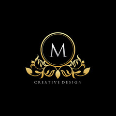 Gold Luxury Boutique Letter M Logo Icon.