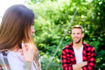 Fototapeta premium Beautiful people. Man hipster falling in love pretty girl. Casual meeting. Love from first sight. If woman knows you like her how will she react. Fall in love. Pure feelings. Romantic date concept