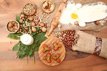 Sweet with ingredients on the wooden table