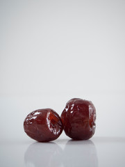 Jujube candied dry fruit on a white background
