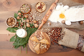 Sweet with ingredients on the wooden table