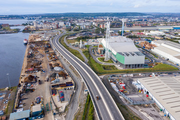 Fototapeta premium Aerial view of Garbage incineration plant. Waste incinerator plant in Splott, Cardiff, Wales, UK. The problem of environmental pollution by factories