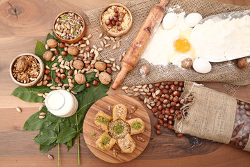 Sweet with ingredients on the wooden table