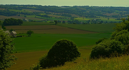 Obraz premium View from the hill on tranquil landscape in rural Normandy