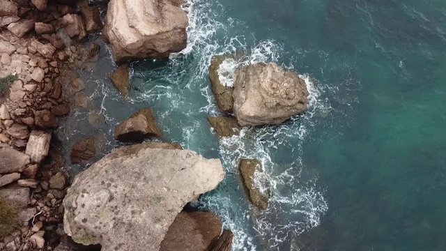 short video of a beach of Ecuador in bird's eye view on a breakwater