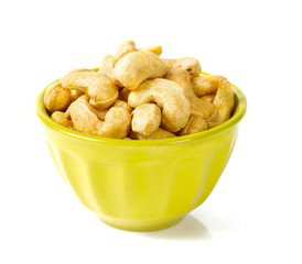 cashew nuts in a bowl isolated on white background