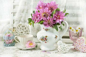 Obraz na płótnie Canvas bunch of pink dahlia in porcelain jug