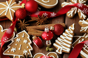 christmas gingerbread cookies and red ornaments
