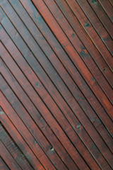 Fototapeta premium stained wood planks fence background - diagonals lines