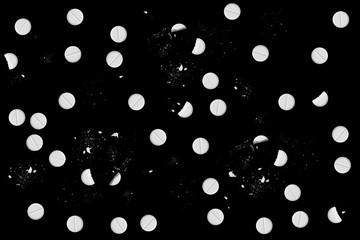 Medicine on black background. Medicines are scattered on a black background