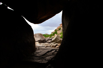 naturally formed cave like structure of stones in Hampi