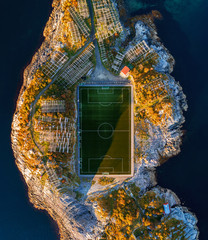 Football field in Henningsvaer from above - obrazy, fototapety, plakaty