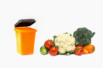 fresh vegetable end yellow bin isolated on white background, image for food zero waste concept.