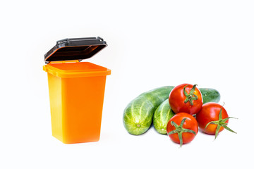 fresh vegetable end yellow bin isolated on white background, image for food zero waste concept.