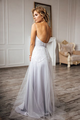 bride in beautiful dress in white Studio