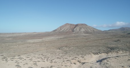 volcanoes and mountains shaping nature by shaping the coast so that the waves give a beautiful shape in a landscape full of landscapes