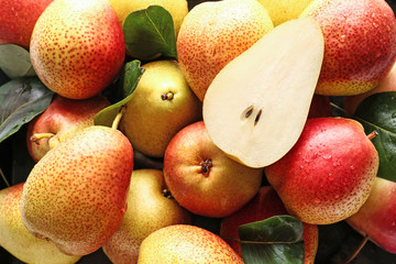 Many sweet ripe pears as background