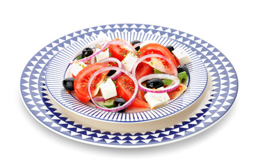 Plate with tasty Greek salad on white background