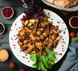 Fried meat with chestnuts and barberries