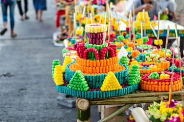 Naklejka premium Krathong made from colorful bread baked Thai style for Loy Krathong Festival or Thai New Year and river goddess worship ceremony,the full moon of the 12th month Be famous festival of Thailand.