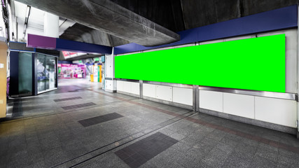 Blank green billboard ready for new advertising for customer information services outdoors at skytrain station,Business marketing concepts
