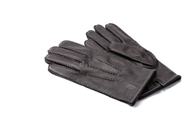 Pair of men's black leather gloves isolated on white background