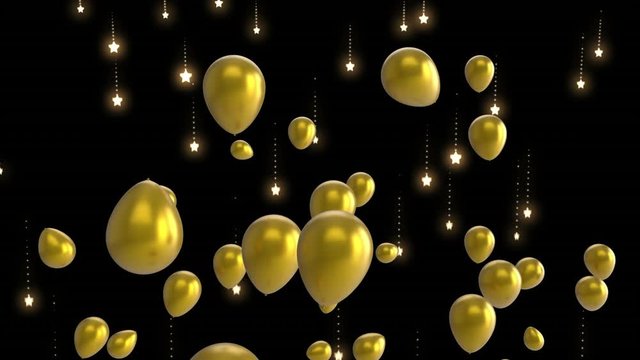 Floating gold balloons and falling stars