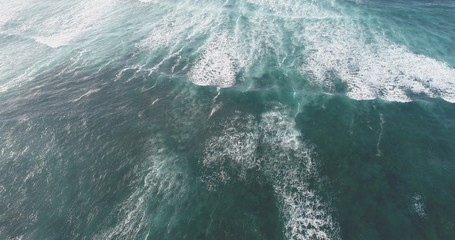 volcanoes and mountains shaping nature by shaping the coast so that the waves give a beautiful shape in a landscape full of landscapes