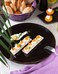 Boiled eggs with yellow caviar